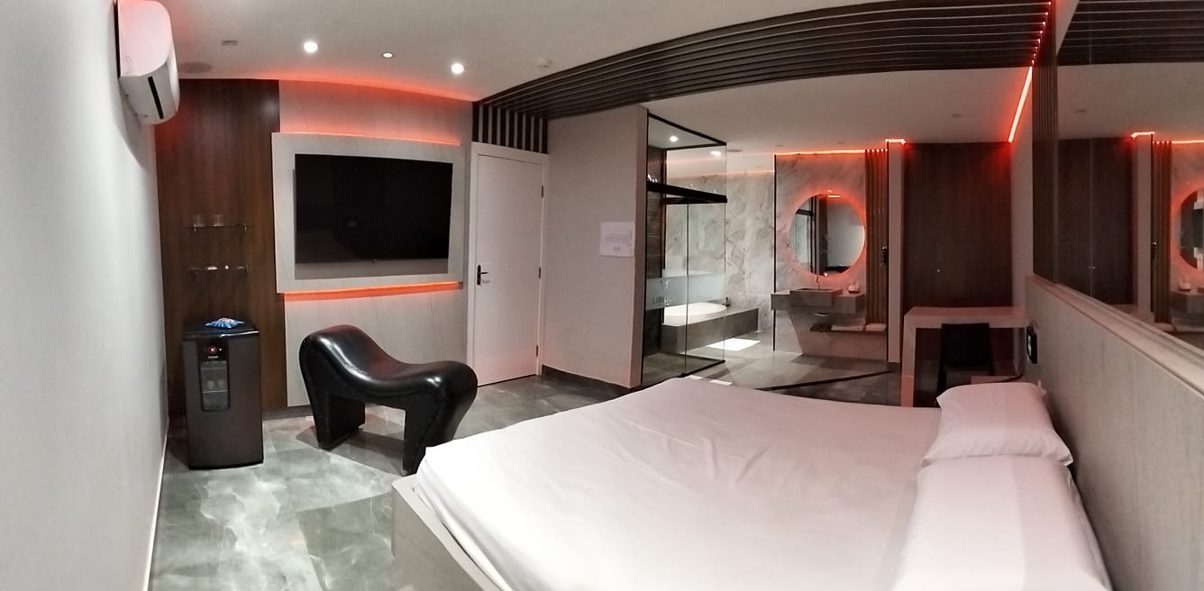 Ambiente íntimo e discreto na Suíte Super Luxo do Motel Libidus Joinville